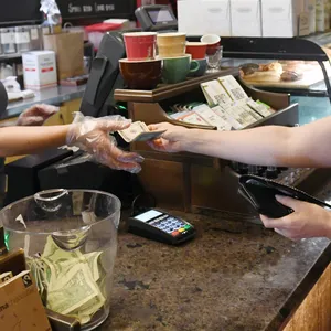 How would banning taxes on tips actually work?